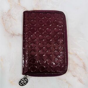 COACH AGENDA- Plum Embossed
Patent Leather with | Silver Hardware & Gold Detail